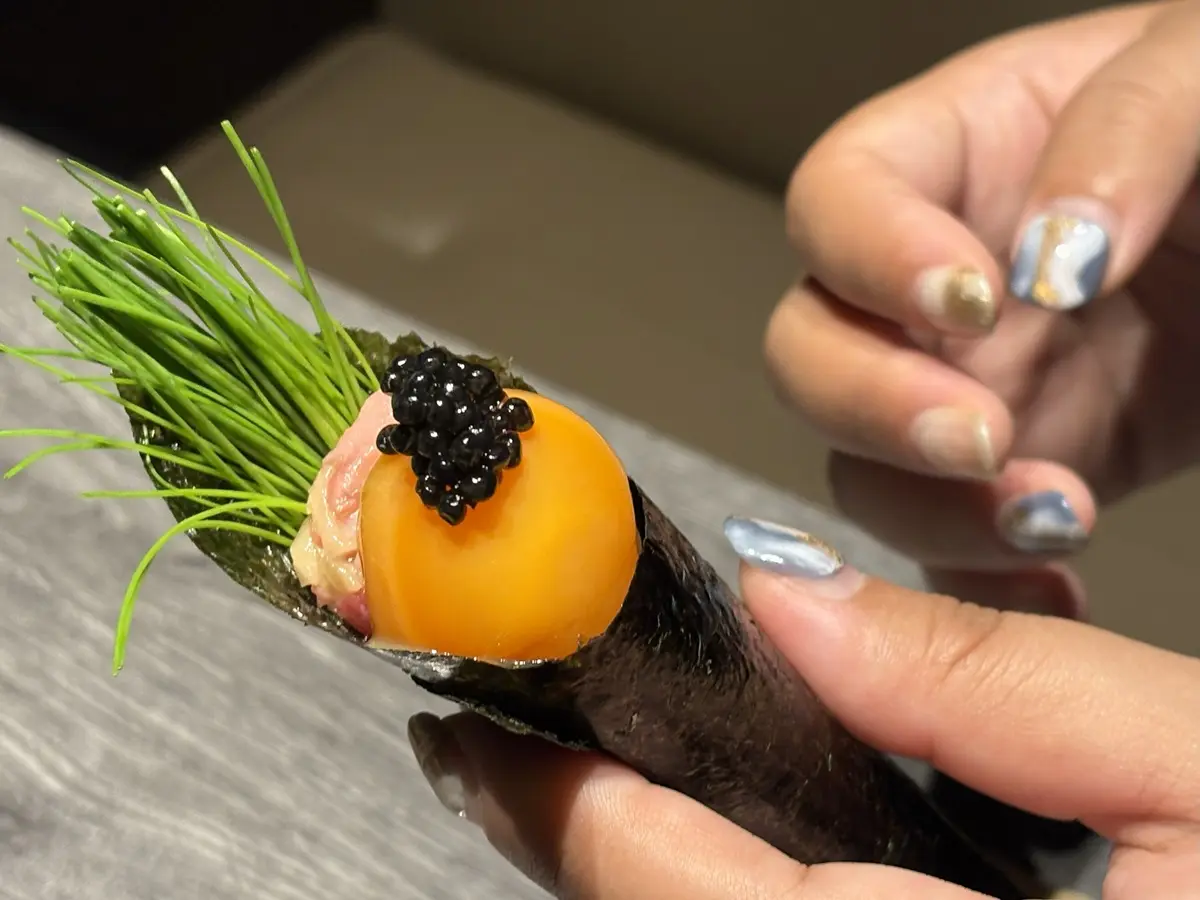 名物うし幸手巻き～有精卵黄漬け～